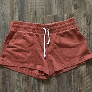 Burnt orange running shorts